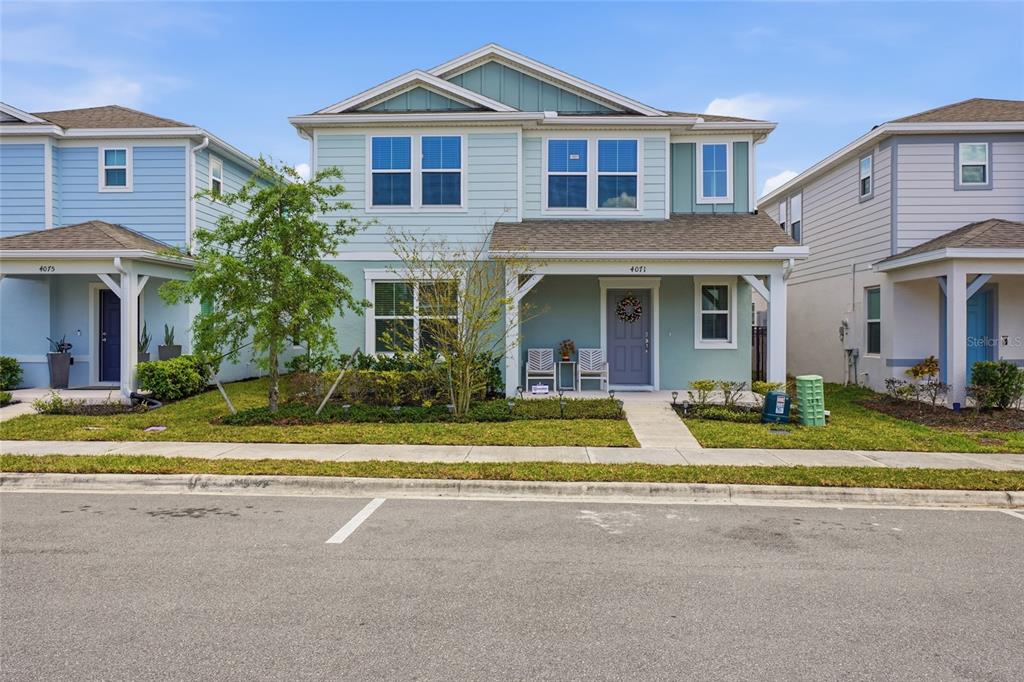 4071 Feather Tree Drive Apopka, FL 32712 - Photo 48 of 52 a front view of a house with a yard