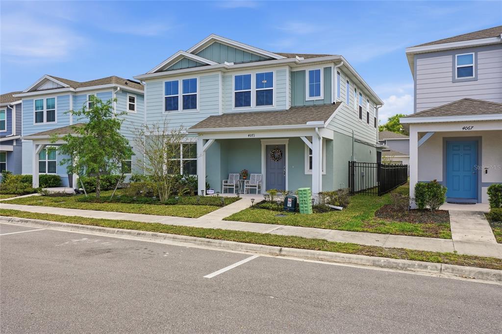 4071 Feather Tree Drive Apopka, FL 32712 - Photo 49 of 52 a front view of a house with a yard