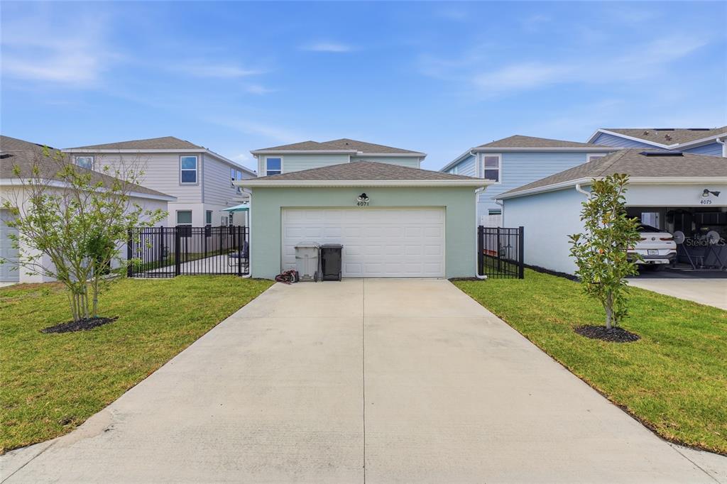 4071 Feather Tree Drive Apopka, FL 32712 - Photo 50 of 52 a house view with a garden space