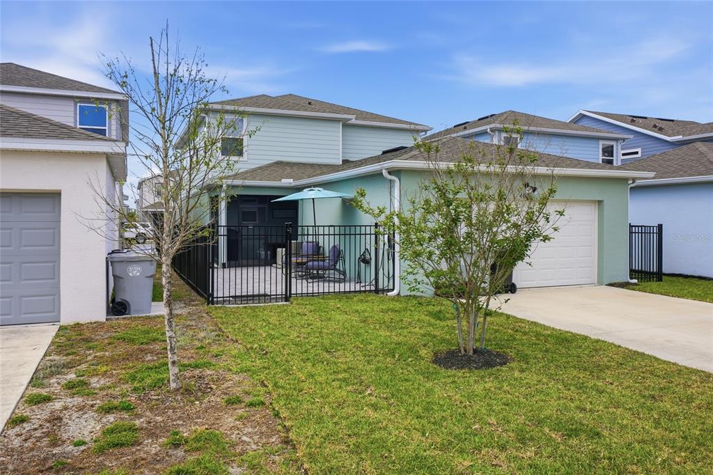 4071 Feather Tree Drive Apopka, FL 32712 - Photo 51 of 52 a front view of a house with garden
