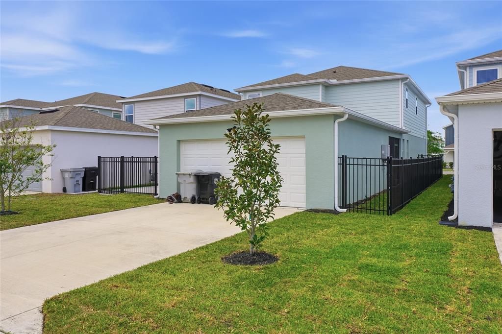 4071 Feather Tree Drive Apopka, FL 32712 - Photo 52 of 52 a view of a house with a yard
