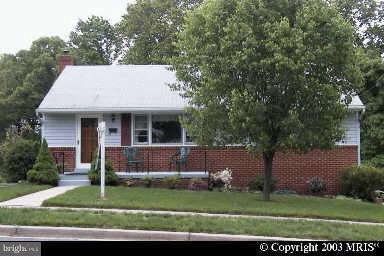 2623 Higbee Road Adelphi, MD 20783 - Photo 1 of 1 a view of a house with a yard