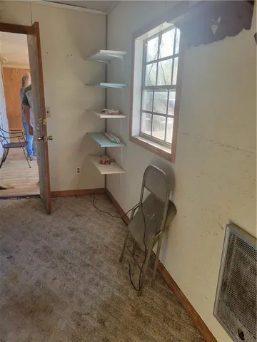 a room with furniture and a window