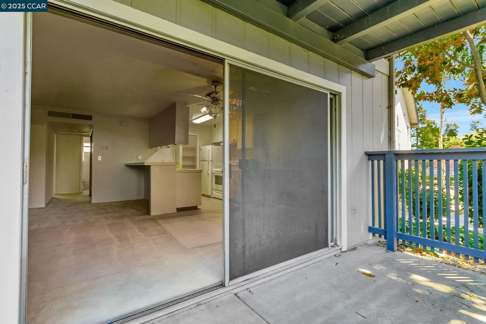9085 Alcosta Boulevard, Unit 340 San Ramon, CA 94583 - Photo 18 of 25 a view of a porch with wooden floor and outdoor space