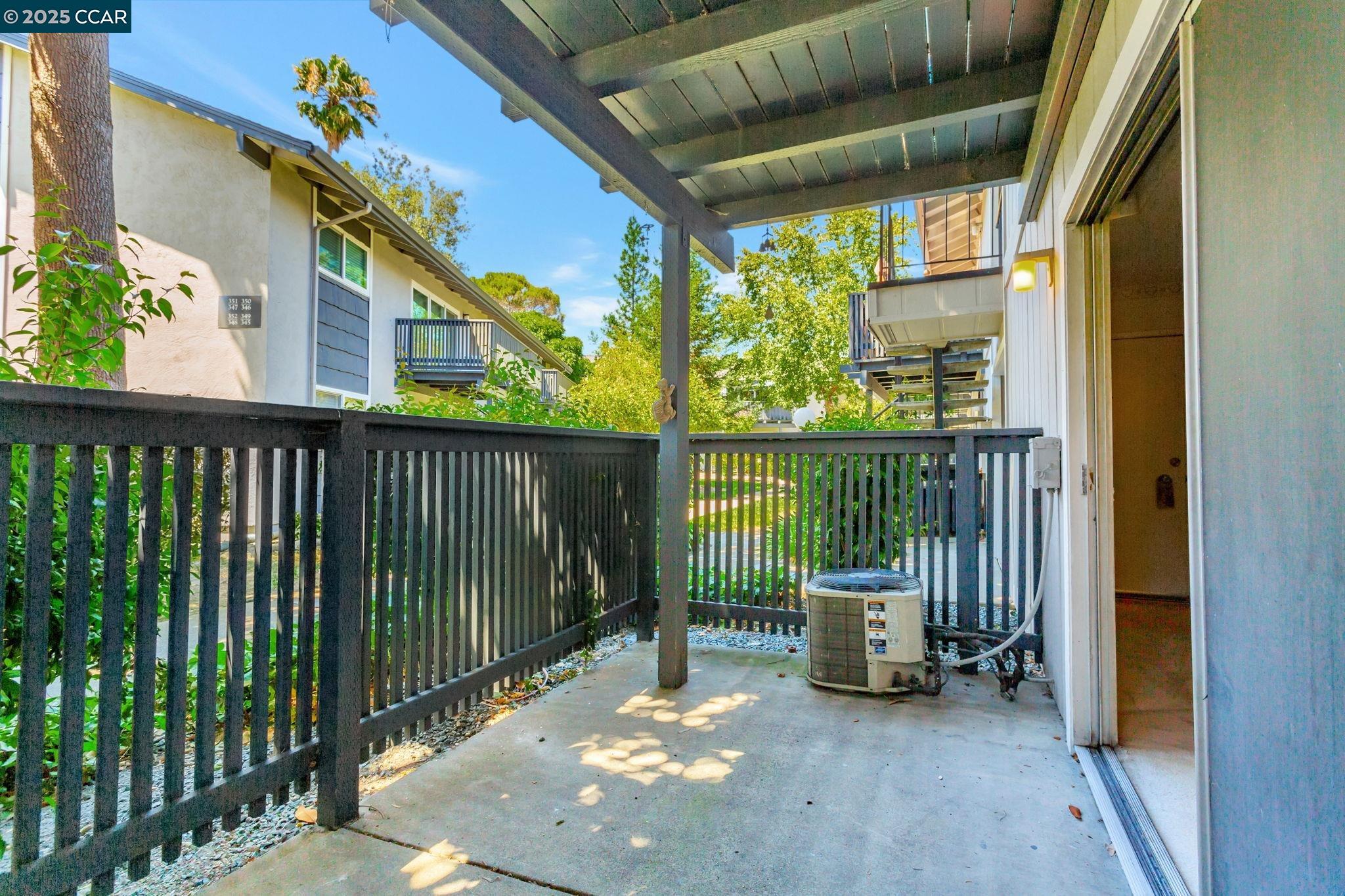9085 Alcosta Boulevard, Unit 340 San Ramon, CA 94583 - Photo 20 of 25 a view of a balcony with floor to ceiling window window