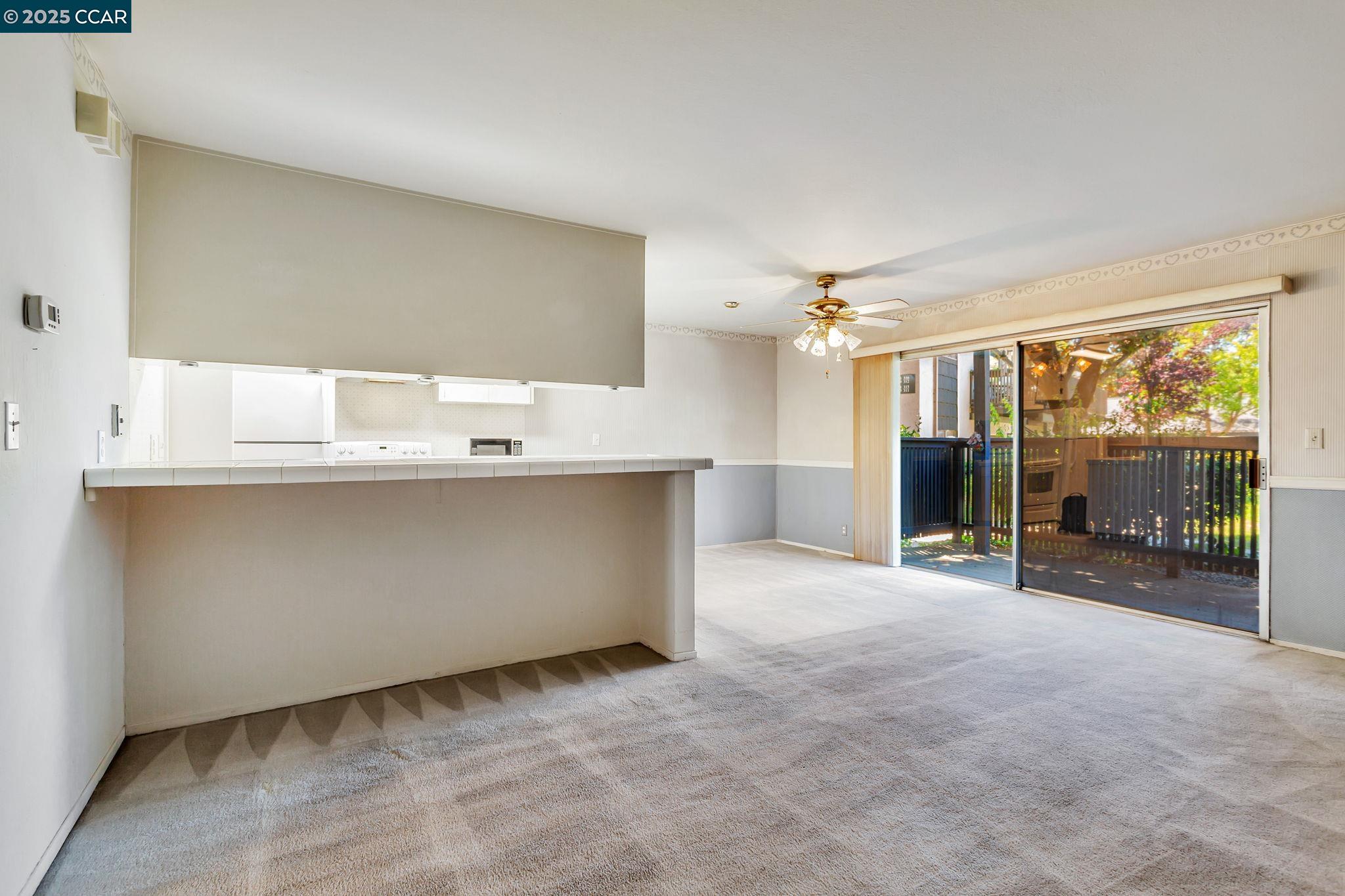 9085 Alcosta Boulevard, Unit 340 San Ramon, CA 94583 - Photo 7 of 25 a view of kitchen with granite countertop cabinets and a sink