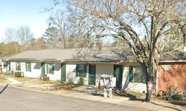 a view of a building with tree s