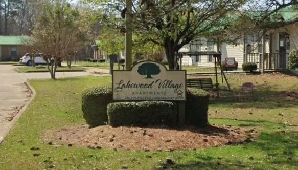 a sign board with parking space
