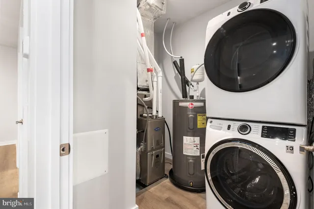 a utility room with dryer and washer