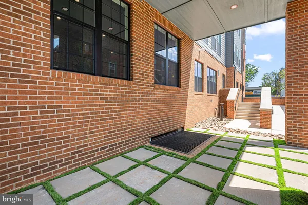 a view of a patio with a outdoor seating