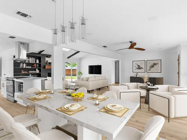 a view of a dining room with furniture