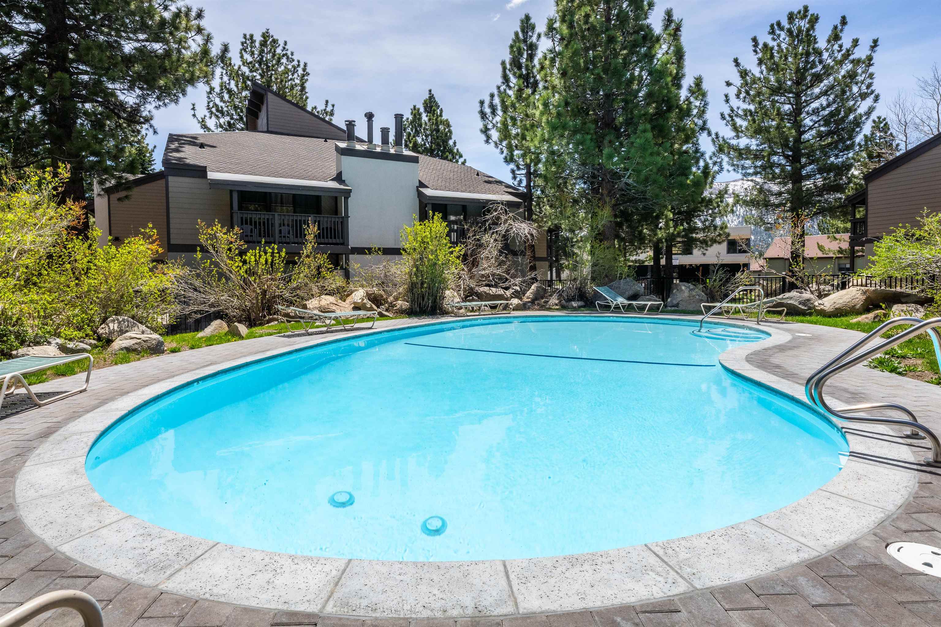 362 Old Mammoth Road, Unit 4 Mammoth Lakes, CA 93546 - Photo 47 of 50 Community pool featuring a patio area and a balcony