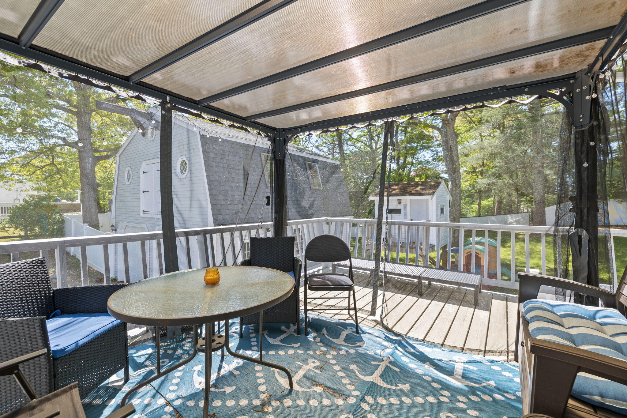 120 Puritan Road Buzzards Bay, MA 02532 - Photo 21 of 28 a view of a chairs and table in the balcony