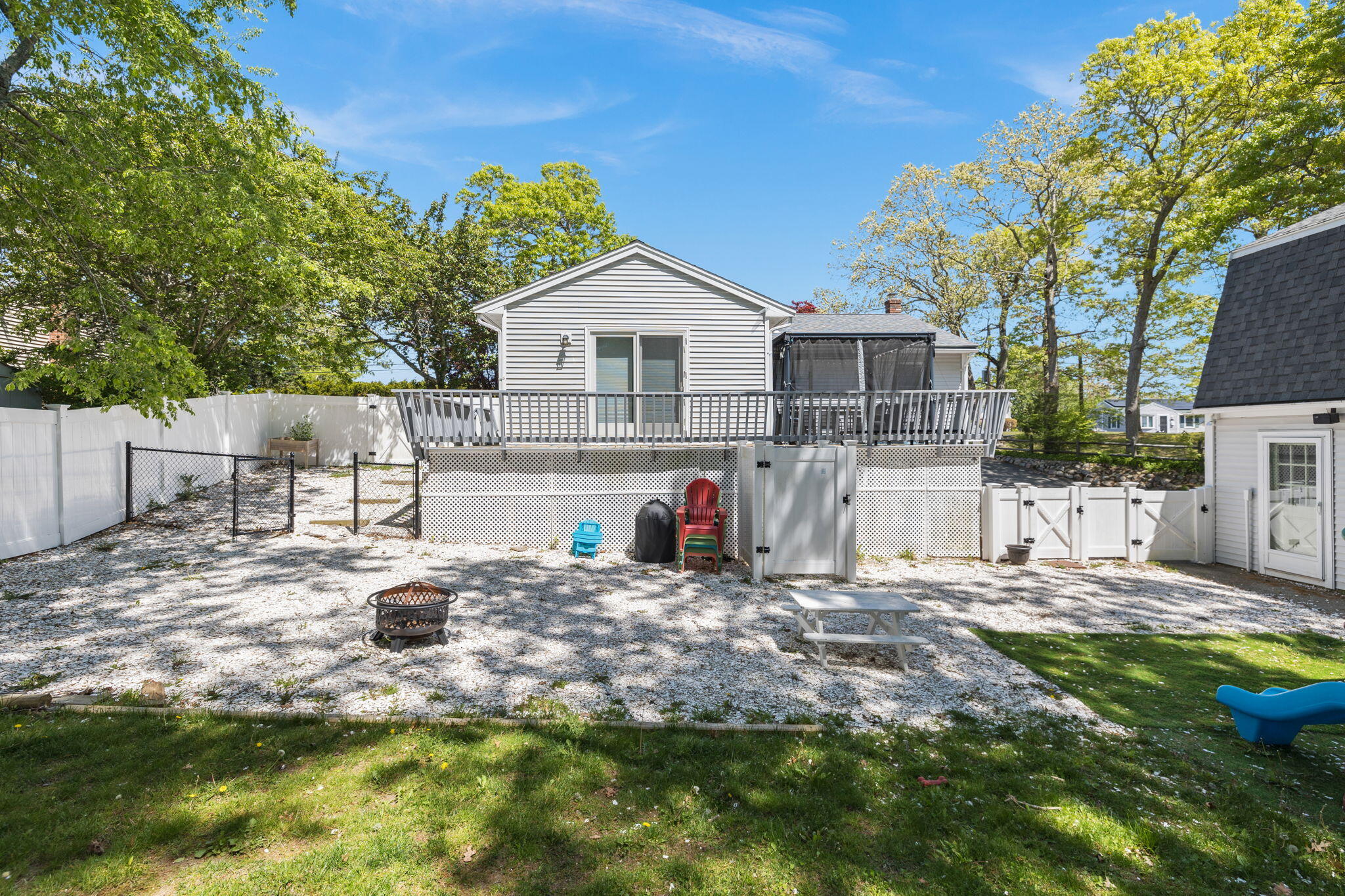 120 Puritan Road Buzzards Bay, MA 02532 - Photo 22 of 28 a view of a house with backyard and trees