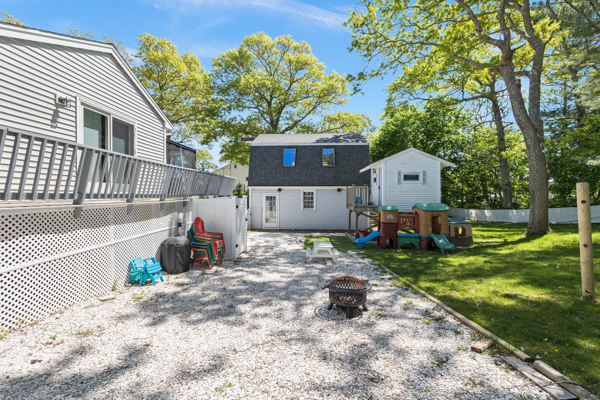 120 Puritan Road Buzzards Bay, MA 02532 - Photo 23 of 28 a front view of a house with garden