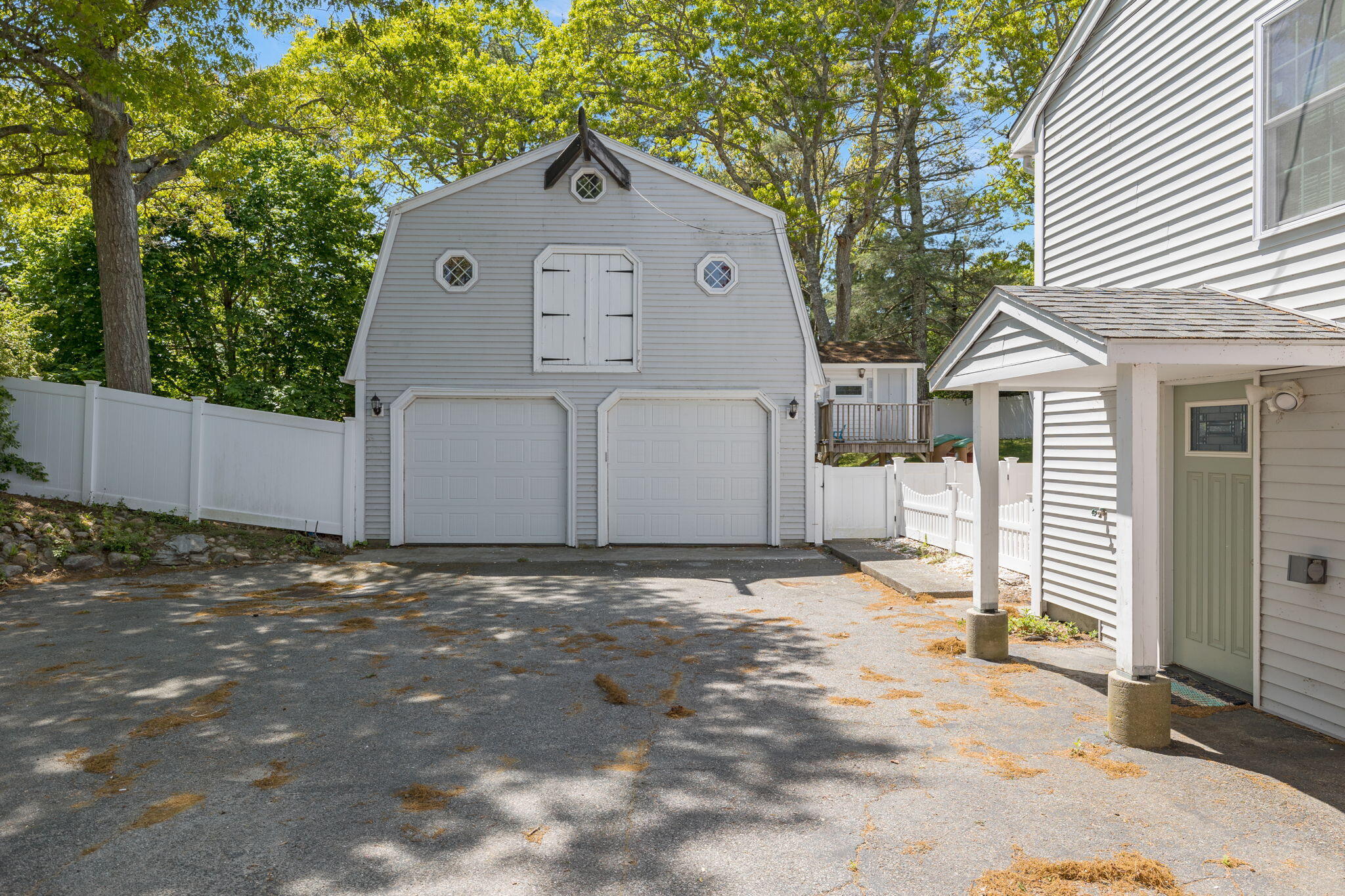 120 Puritan Road Buzzards Bay, MA 02532 - Photo 26 of 28 a view of a grey house with a yard