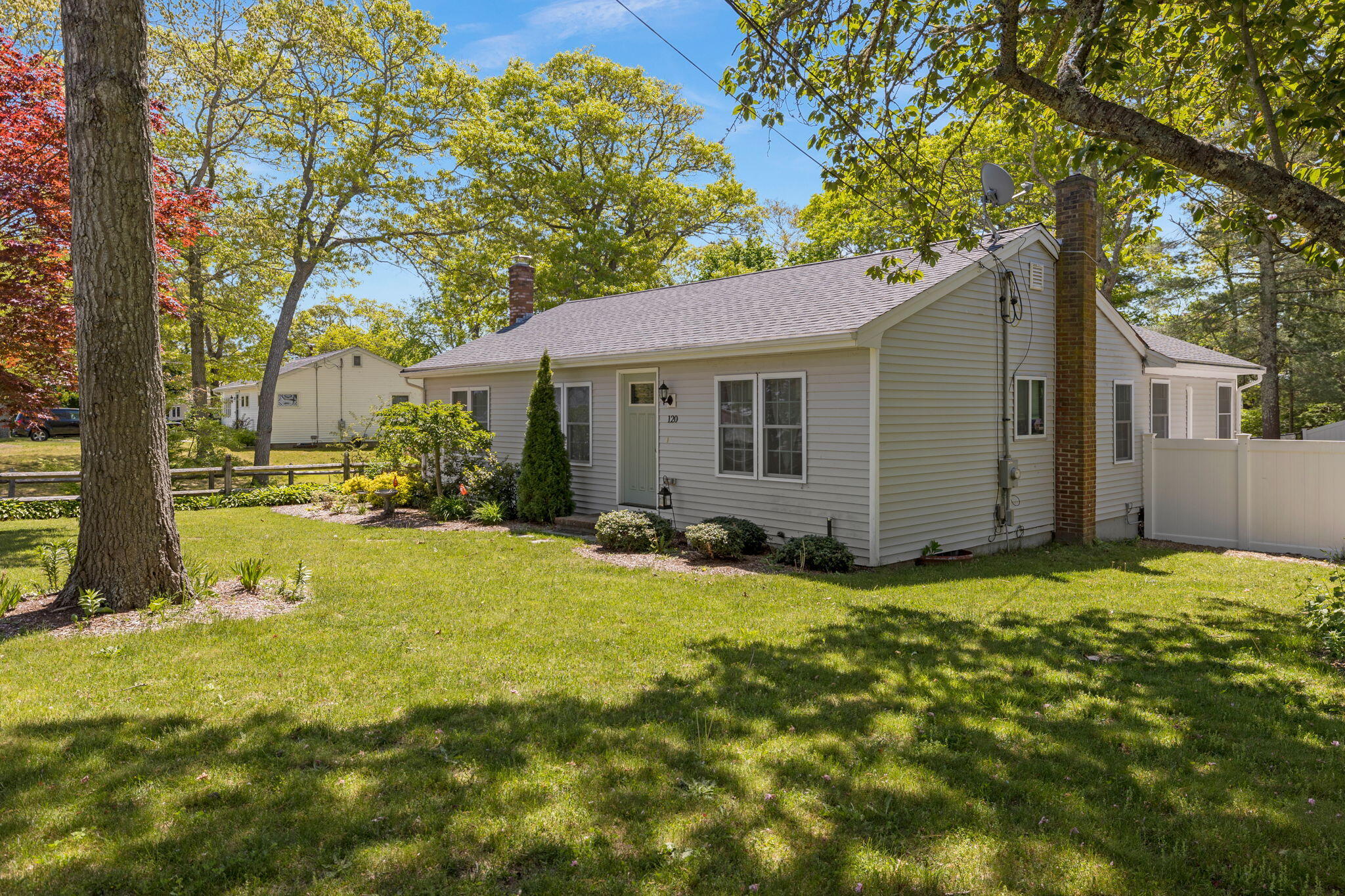 120 Puritan Road Buzzards Bay, MA 02532 - Photo 28 of 28 a view of a house with a backyard