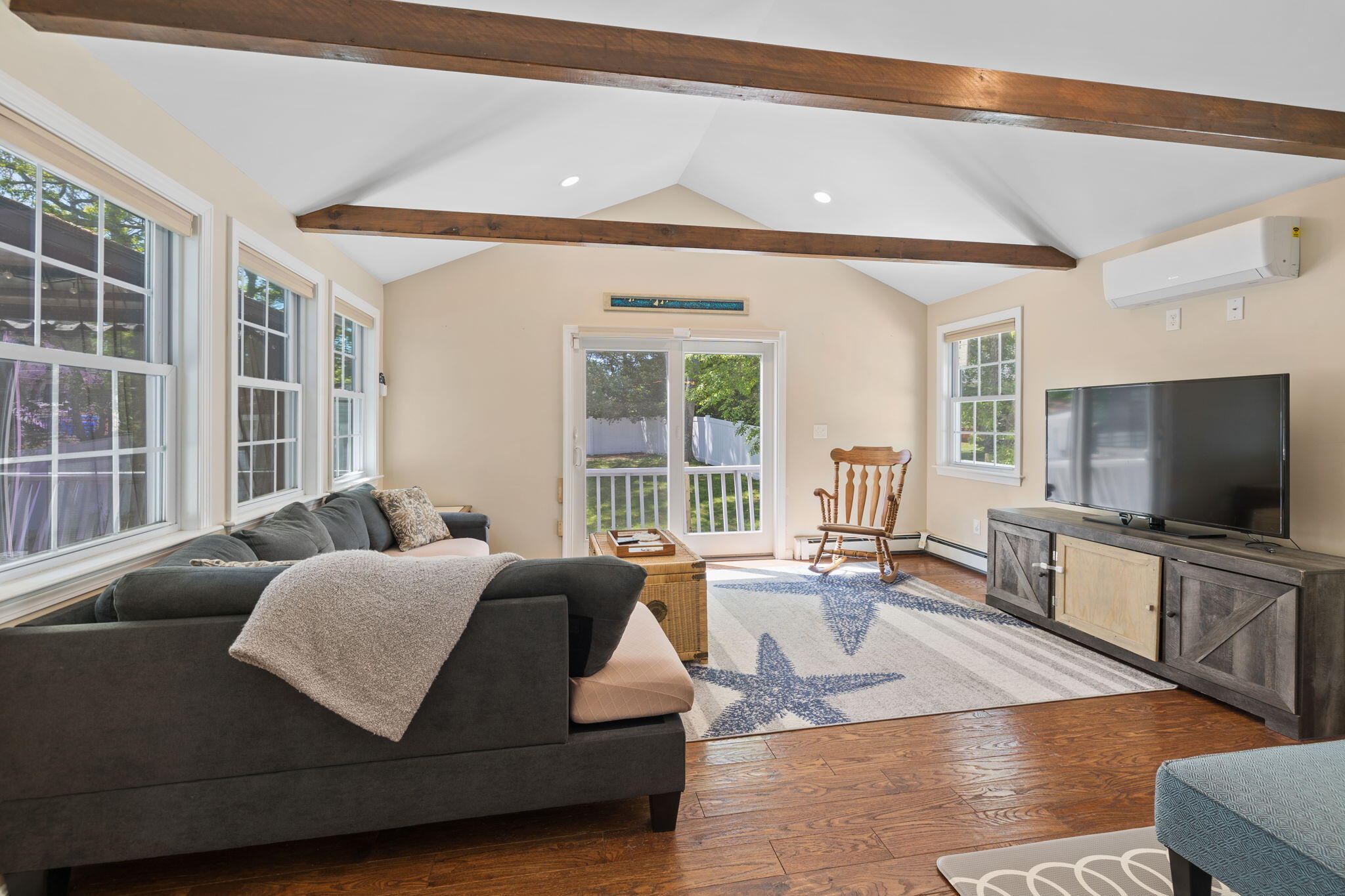 120 Puritan Road Buzzards Bay, MA 02532 - Photo 4 of 28 a living room with furniture and a flat screen tv