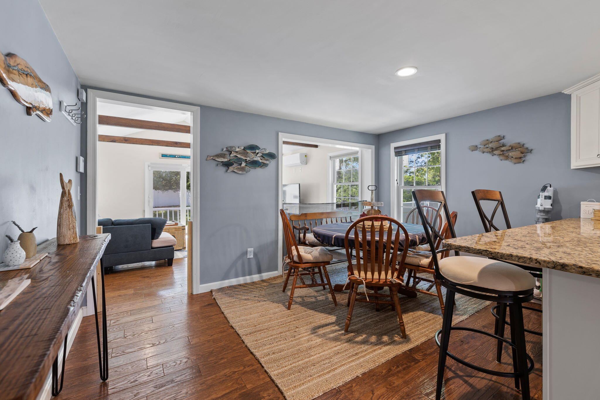 120 Puritan Road Buzzards Bay, MA 02532 - Photo 10 of 28 a view of a dining room with furniture window and wooden floor