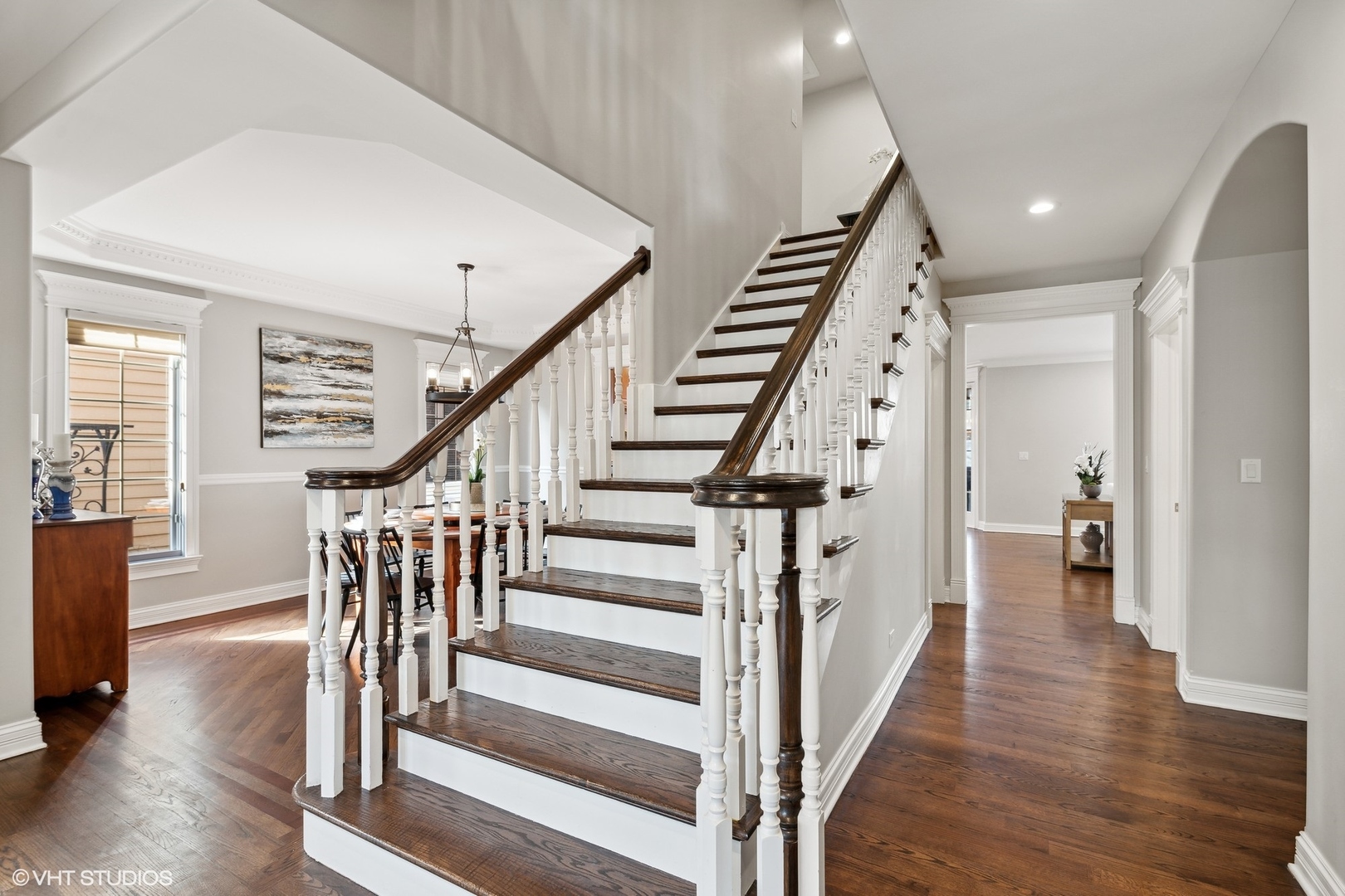 254 Ridgeland Avenue Elmhurst, IL 60126 - Photo 4 of 37 a view of a hallway with the wooden floor and staircase