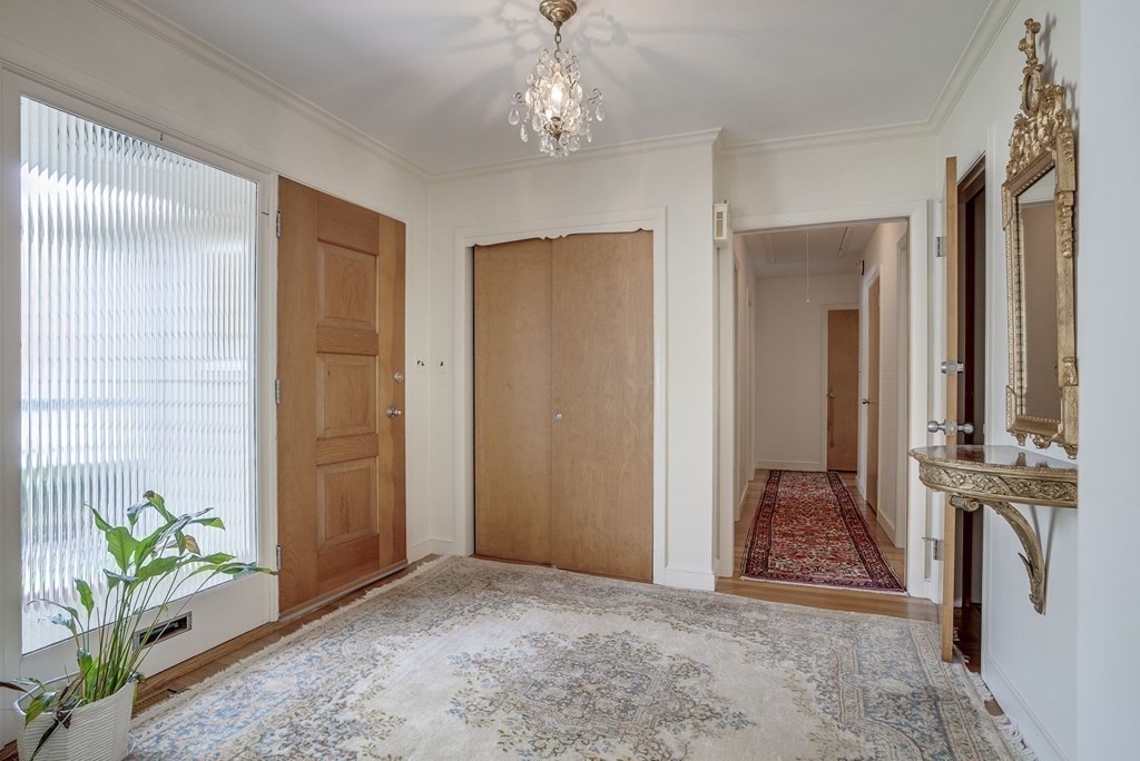 18 Apache Trail Arlington, MA 02474 - Photo 17 of 30 a view of livingroom with hardwood floor and hallway