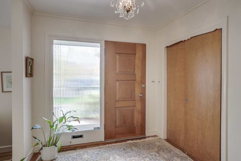 18 Apache Trail Arlington, MA 02474 - Photo 2 of 30 a living room with windows