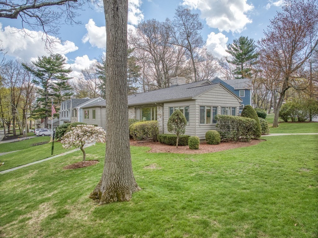 18 Apache Trail Arlington, MA 02474 - Photo 25 of 30 a view of a house with a yard and trees