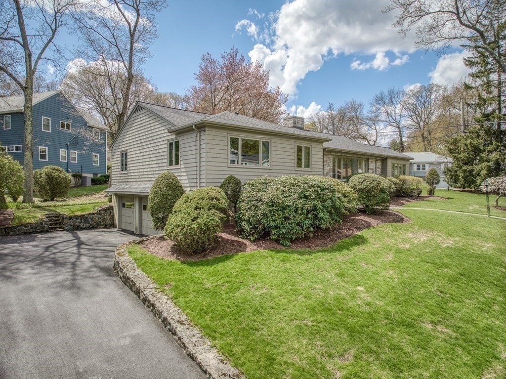 18 Apache Trail Arlington, MA 02474 - Photo 26 of 30 a view of a house with backyard and garden