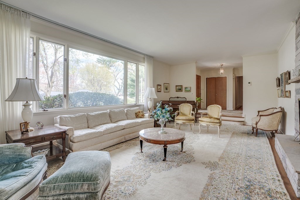 18 Apache Trail Arlington, MA 02474 - Photo 3 of 30 a living room with furniture and a large window
