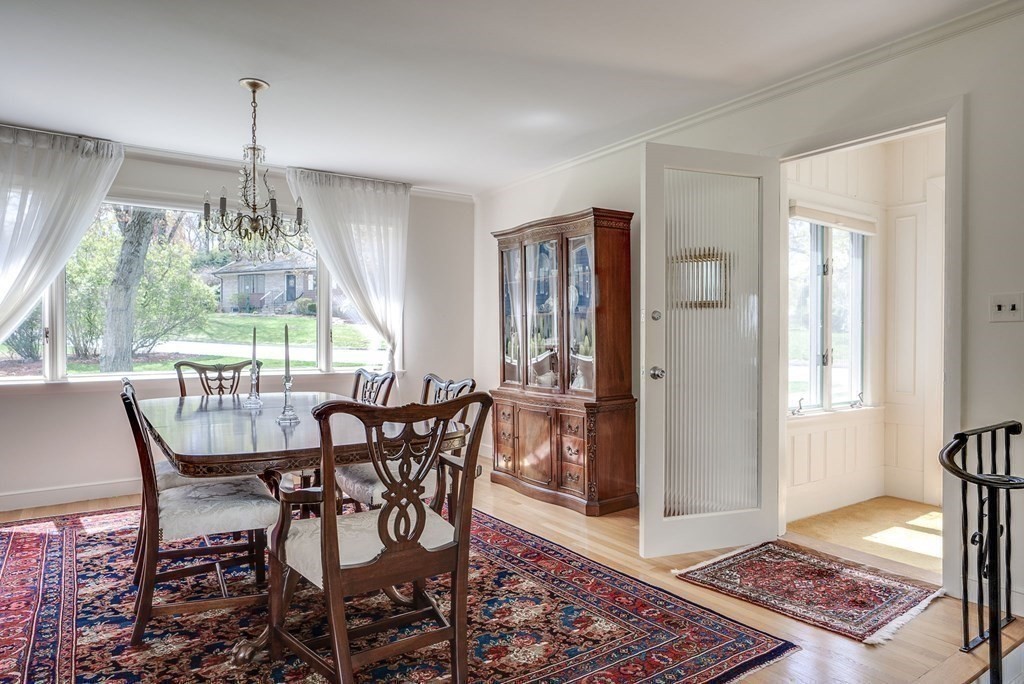 18 Apache Trail Arlington, MA 02474 - Photo 7 of 30 a view of a dining room with furniture window and wooden floor