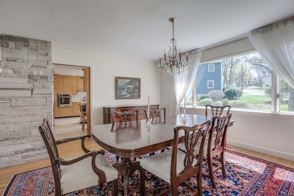 18 Apache Trail Arlington, MA 02474 - Photo 8 of 30 a view of a dining room with furniture window and outside view