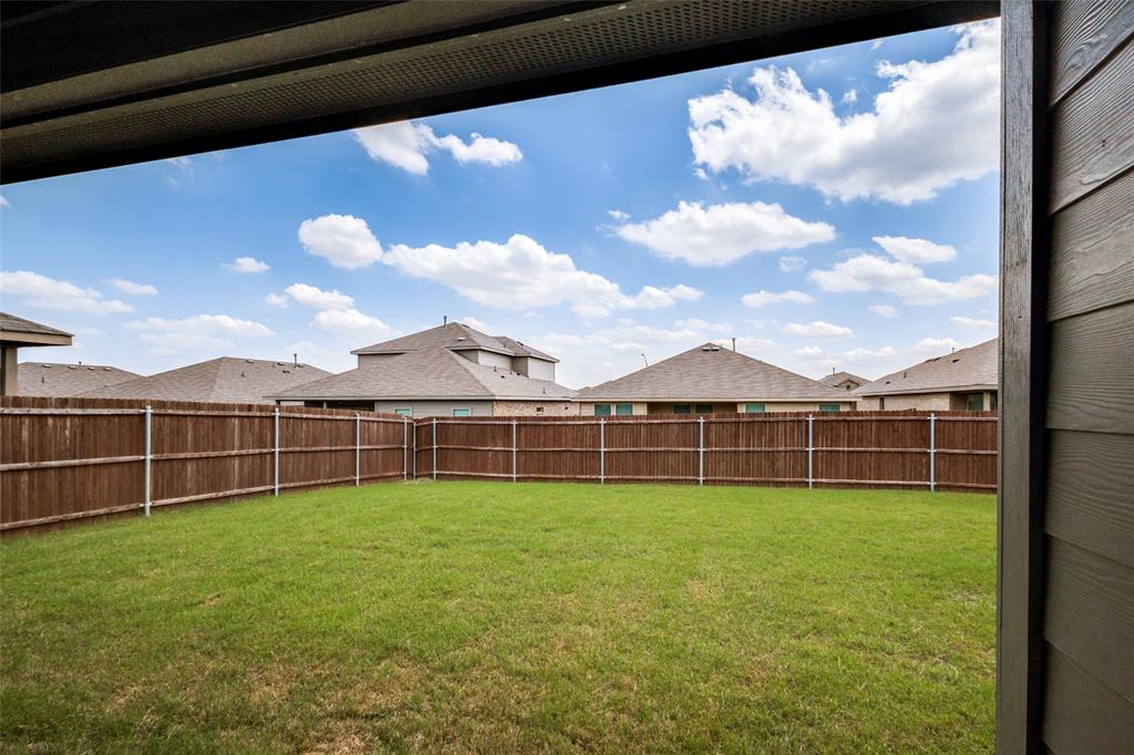 621 Spaulding Street Justin, TX 76247 - Photo 21 of 22 a view of a backyard