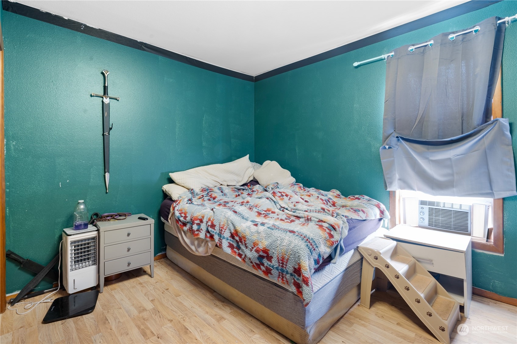 406 Cleveland Sumas, WA 98295 - Photo 11 of 33 a bedroom with a bed and a cabinets