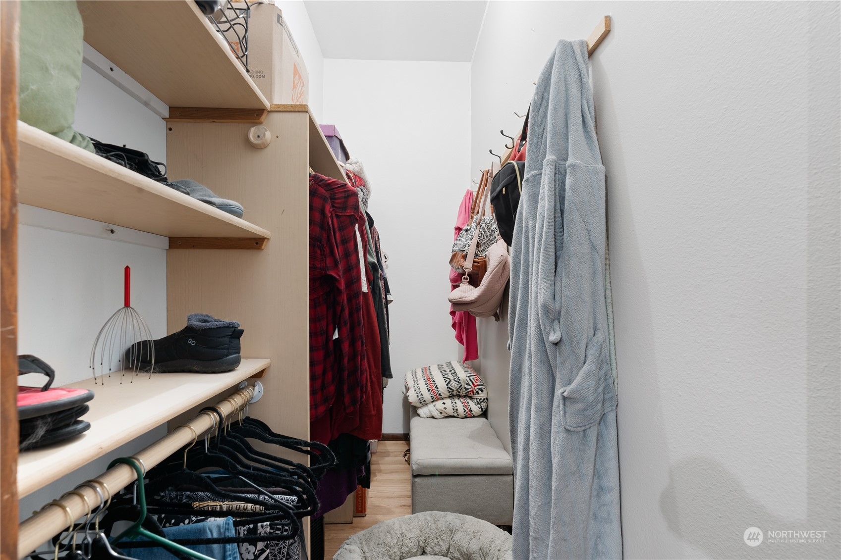 406 Cleveland Sumas, WA 98295 - Photo 16 of 33 a view of walk in closet with clothes and shoes