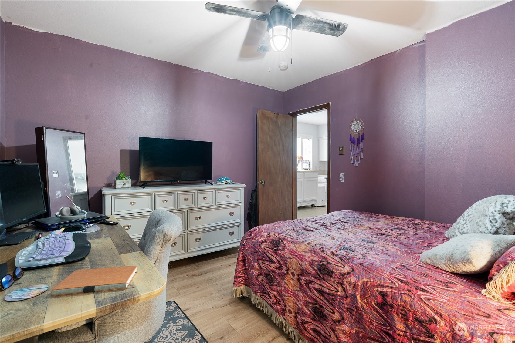 406 Cleveland Sumas, WA 98295 - Photo 17 of 33 a bedroom with a bed and a flat screen tv