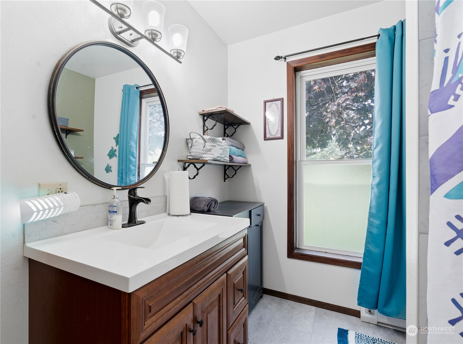 406 Cleveland Sumas, WA 98295 - Photo 18 of 33 a kitchen with a sink a stove and a mirror