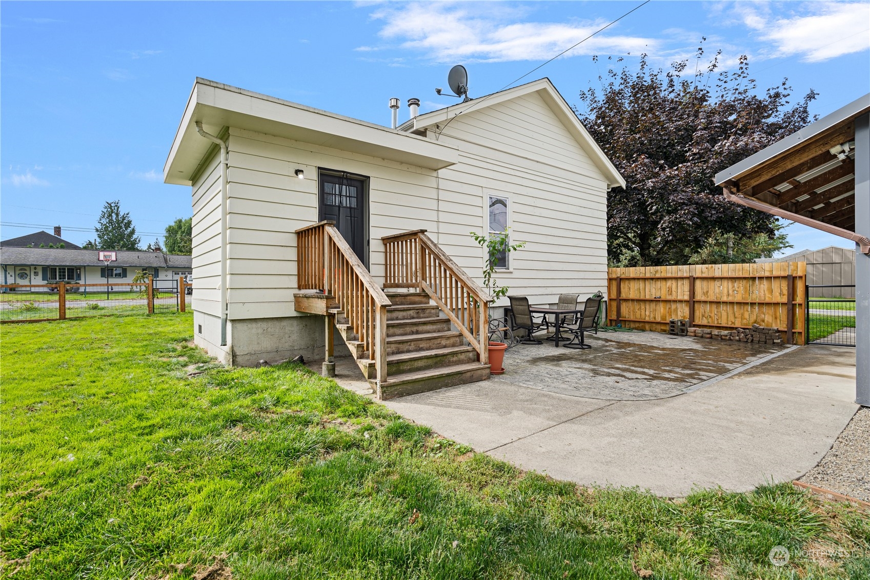 406 Cleveland Sumas, WA 98295 - Photo 26 of 33 a view of a house with a yard