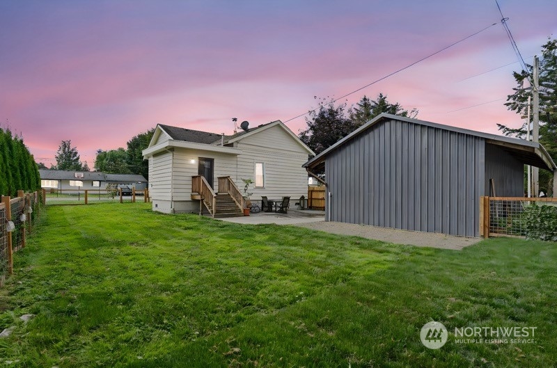 406 Cleveland Sumas, WA 98295 - Photo 32 of 33 a view of a house with a yard
