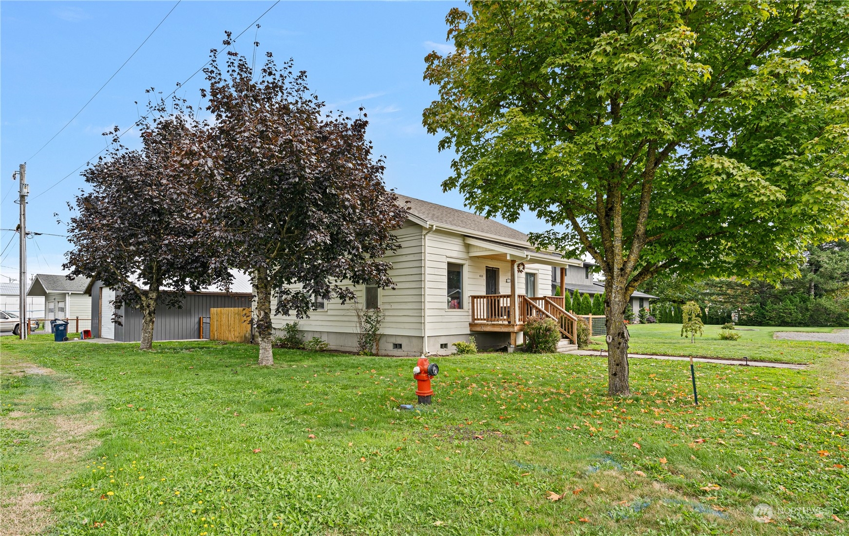 406 Cleveland Sumas, WA 98295 - Photo 5 of 33 a view of a house with a backyard
