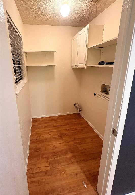 503 Algerita Drive, Unit B Georgetown, TX 78628 - Photo 17 of 30 a view of a kitchen with white cabinets
