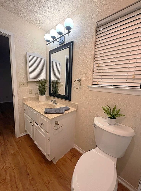 503 Algerita Drive, Unit B Georgetown, TX 78628 - Photo 18 of 30 a bathroom with a toilet sink and mirror