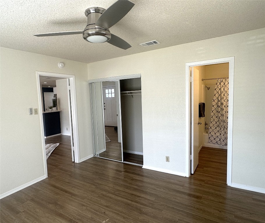 503 Algerita Drive, Unit B Georgetown, TX 78628 - Photo 27 of 30 a view of an empty room with wooden floor