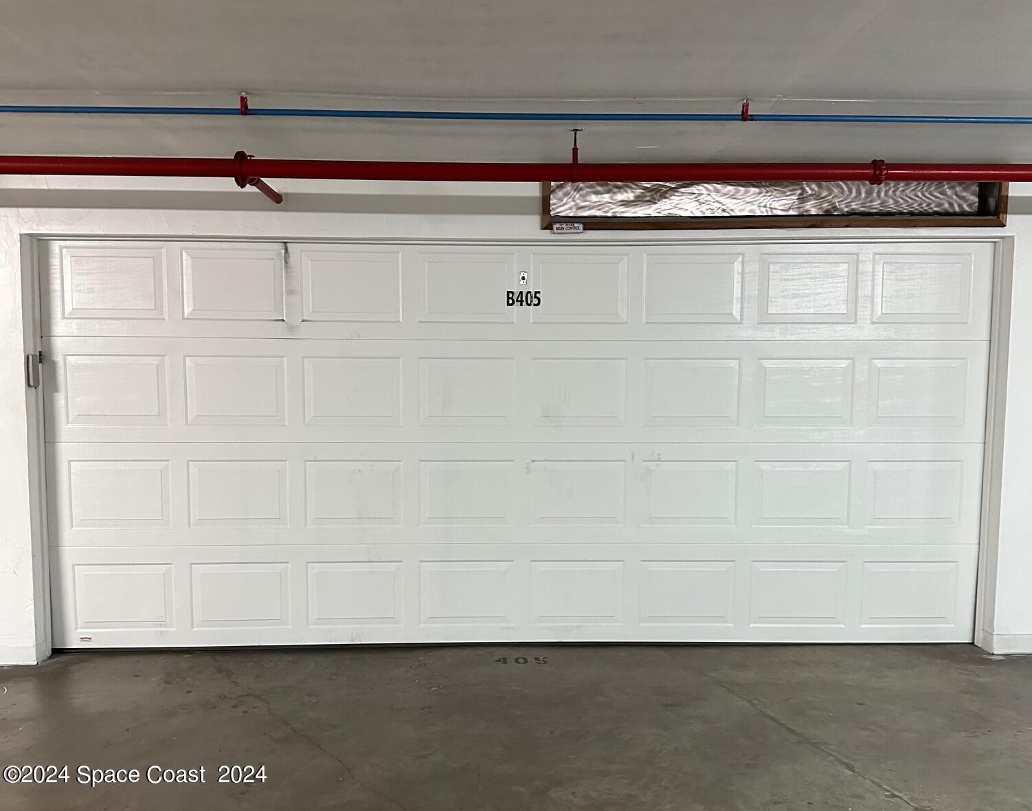 102 Riverside Drive, Unit 405 Cocoa, FL 32922 - Photo 47 of 99 2 Car Garage w/ storage