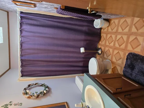 a view of a balcony with furniture