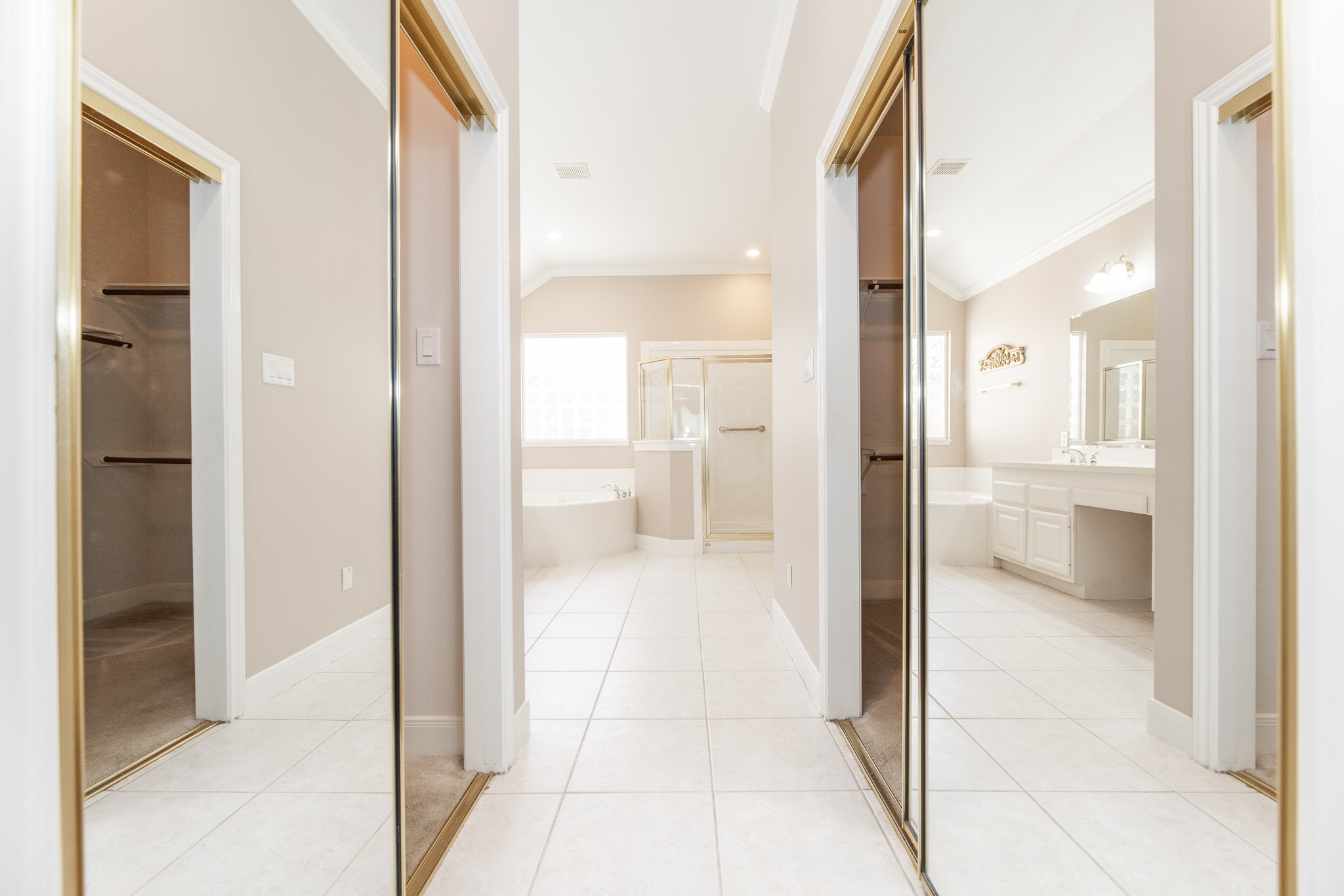 1222 Brinson Court Spring, TX 77379 - Photo 23 of 35 a bathroom with a glass door shower and a sink