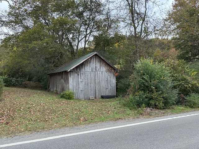 4308 Old Hillsboro Road Franklin, TN 37064 - Photo 3 of 11 a wooden fence with a small yard