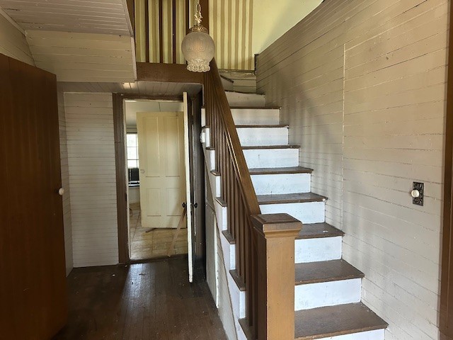 4308 Old Hillsboro Road Franklin, TN 37064 - Photo 6 of 11 a view of a hallway with wooden floor and staircase