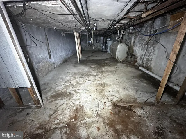 a view of a room with wooden walls