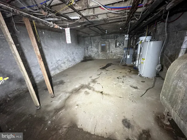 a bathroom with a tub and shower