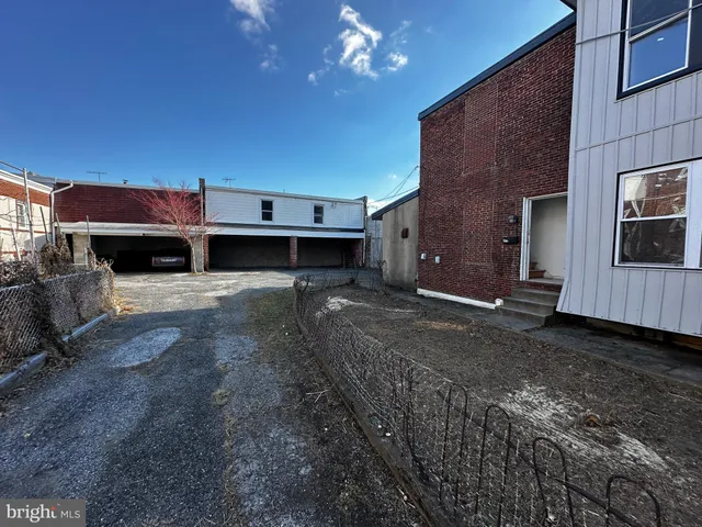 a view of a livingroom with furniture and chandelier